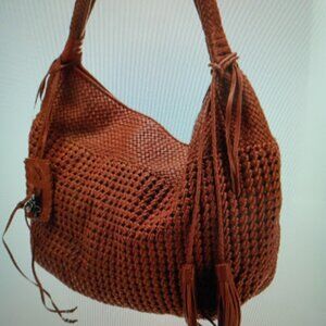 Ralph Lauren new with no tags leather bag with leather zip pouch and dust bag.